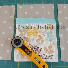 HOW TO MAKE: an Adjustable Fabric Book Cover at astitchahalf.net
