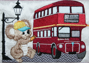 Fuzzy Koala Bear Oliver at a Red London Bus