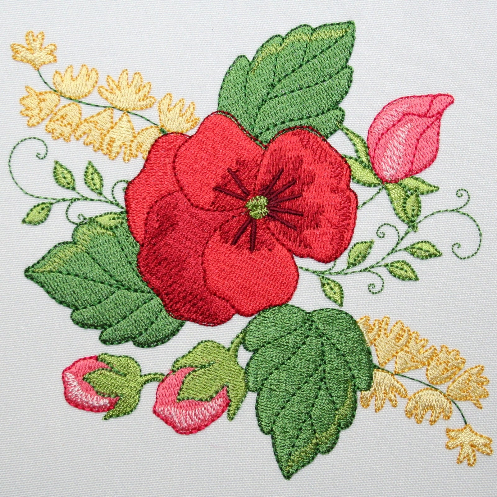 Embroidered floral design on a white shirt pocket