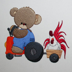 Daniel driving the tractor