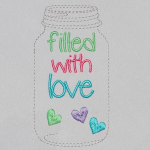 Mason glass jar filled with Love