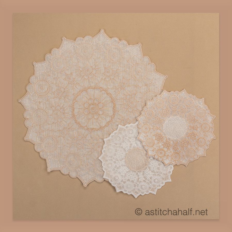 Dining table setting with a plate, knife, spoon, and glass on lace placemats.
