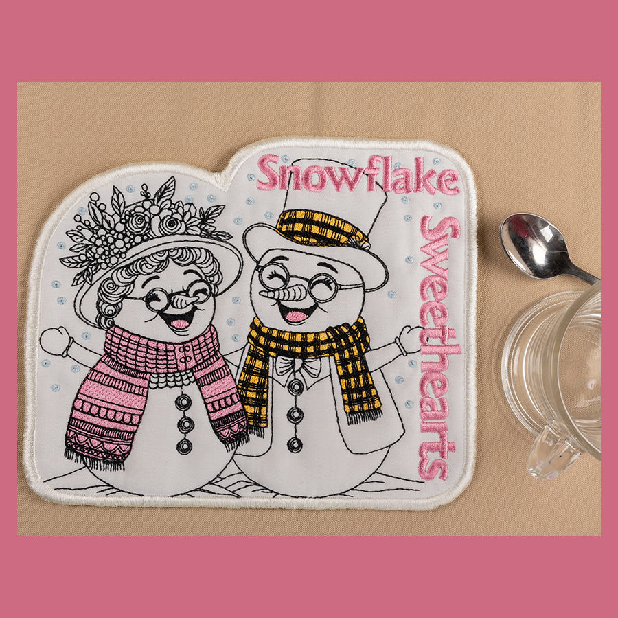 Laughing and smiling coasters and mug rugs snowman and snowwoman in yellow and pink with bright scarves. 