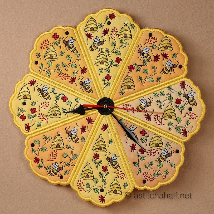 Decorative wall clock with bee and honeycomb design on a beige background