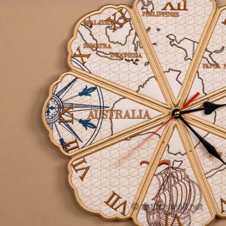Decorative wall clock with map design and ship illustration on a beige background