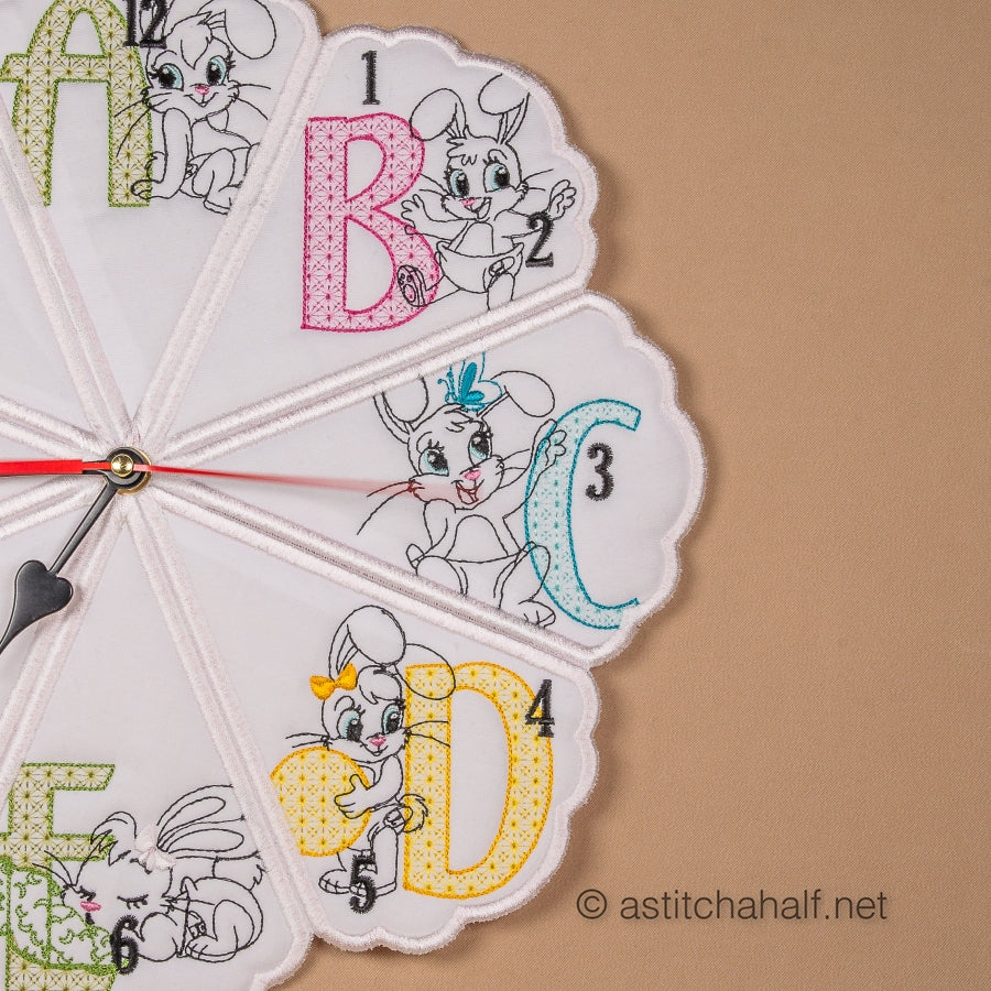 Decorative clock with cartoon character faces and letters on a beige background