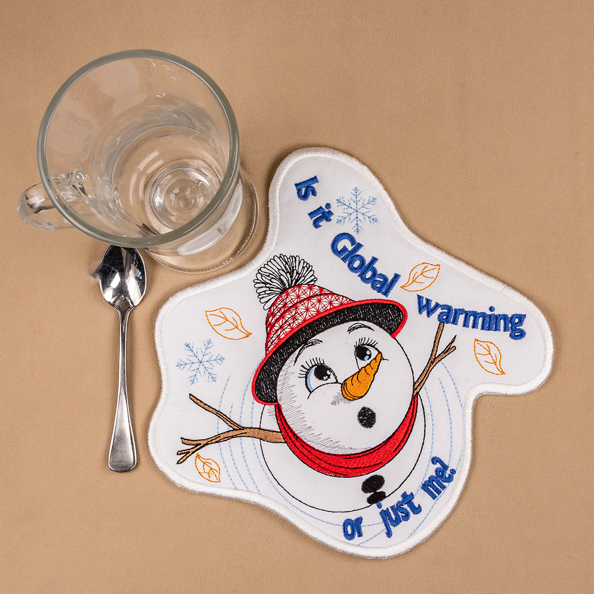 Patch with a snowman design and text on a beige background