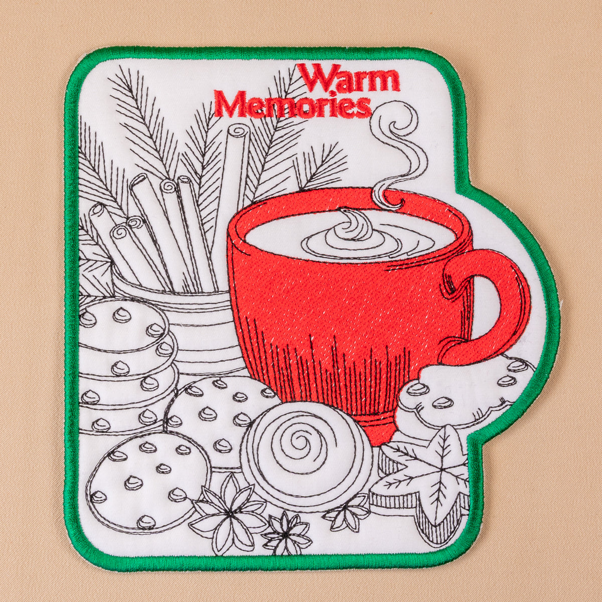 Coaster with red coffee cup design and 'Warm Memories' text on a beige background
