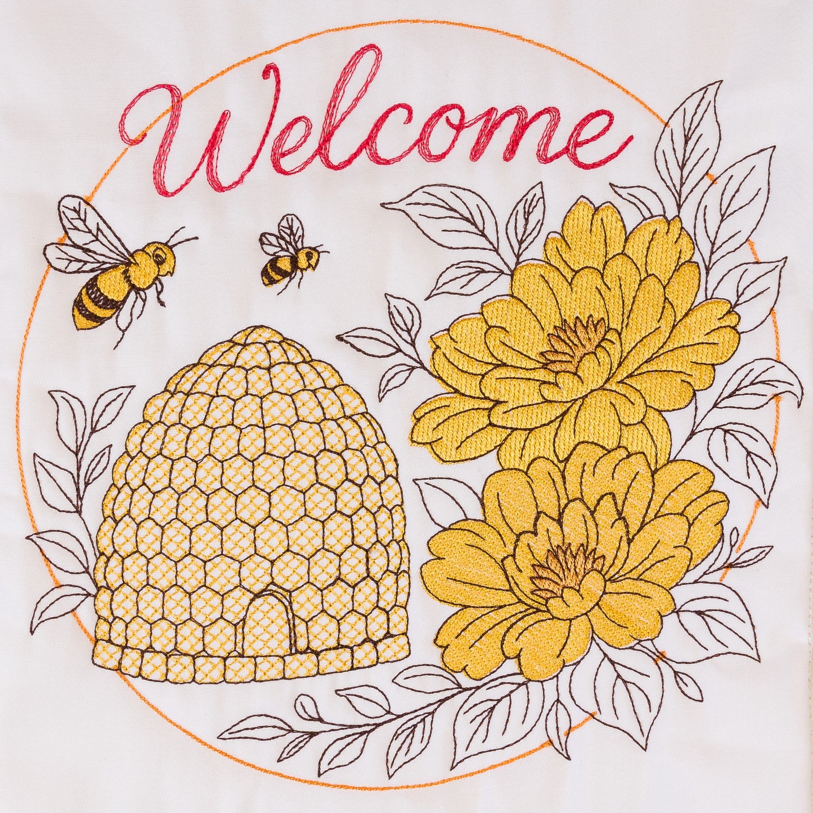 Decorative garden flag with floral design, beehive, and bees on a beige background