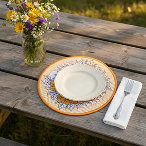 Round embroidered patch with yellow flowers and bees on a beige background