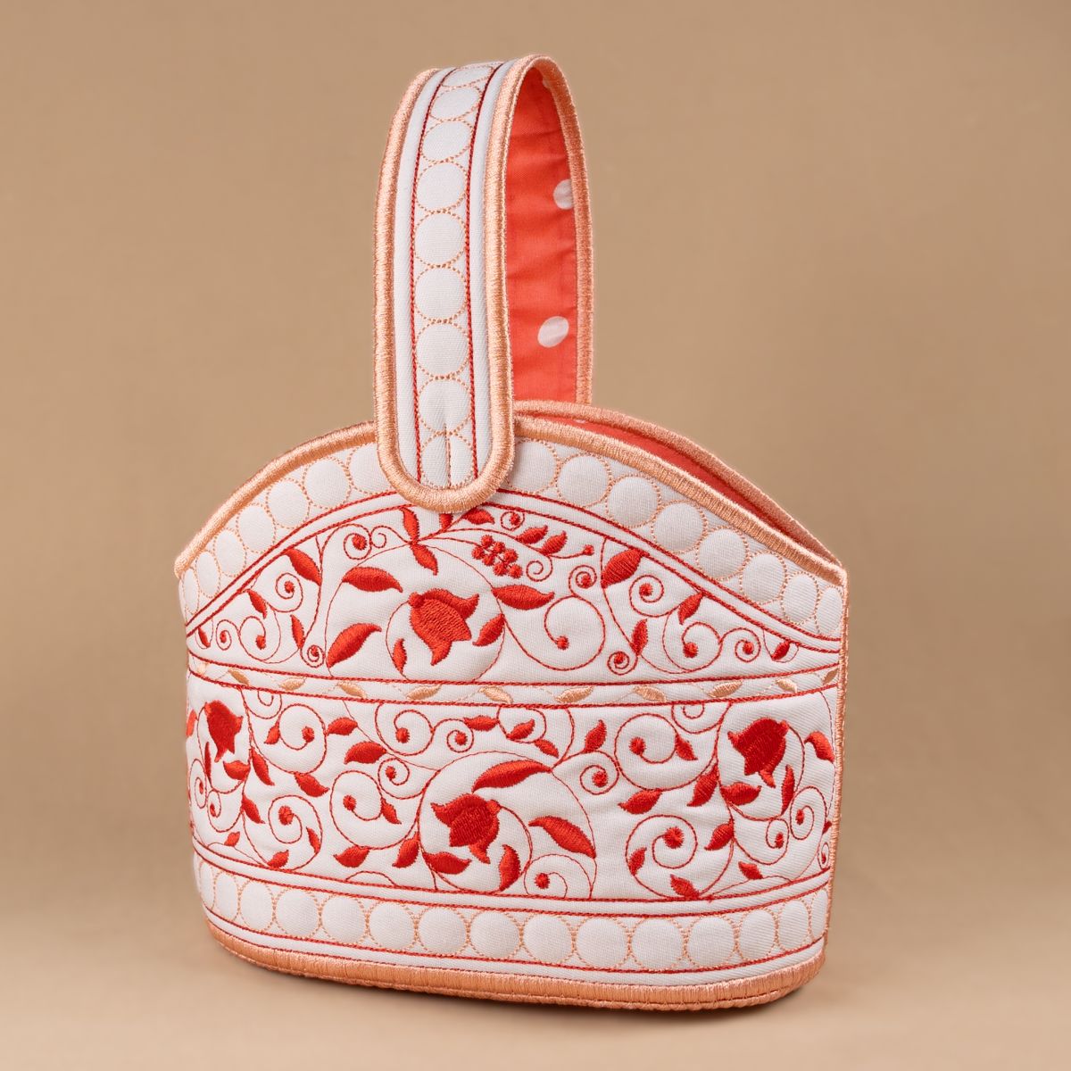 Decorative basket with floral patterns on a beige background