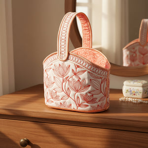 Fabric basket with floral embroidery on a beige background