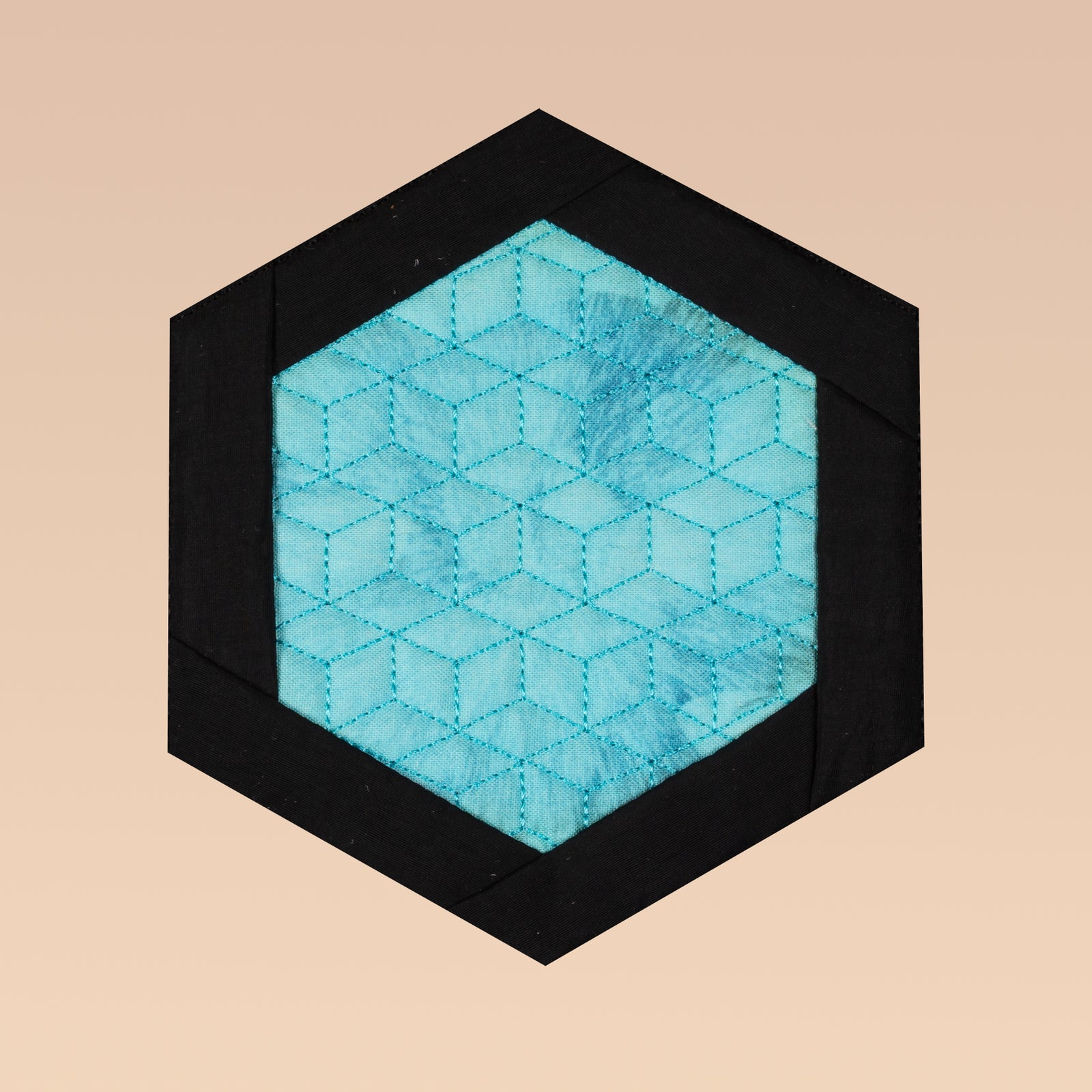 Hexagonal placemats with colorful inserts on a beige background