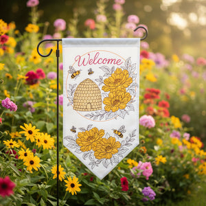 Decorative garden flag with floral design, beehive, and bees on a beige background