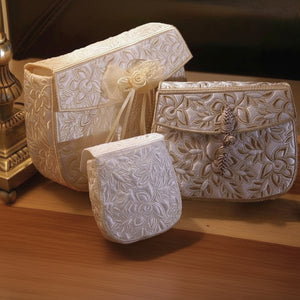 Whispers in White Clutch Purses