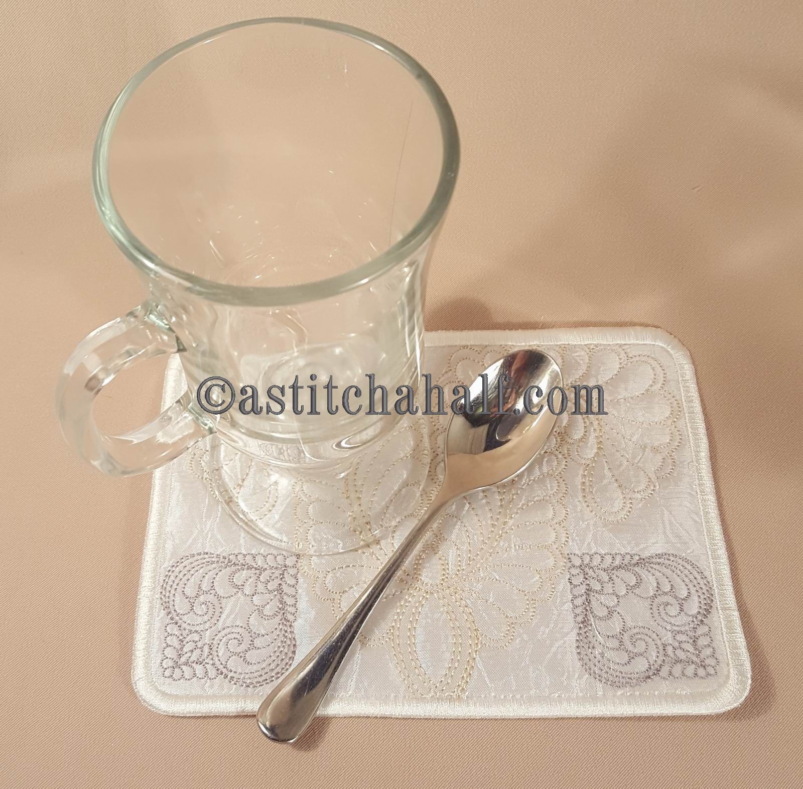 Feather Fountain Mug Rug - a-stitch-a-half