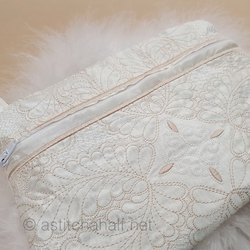 Fine Feathers ITH Wrist Purse