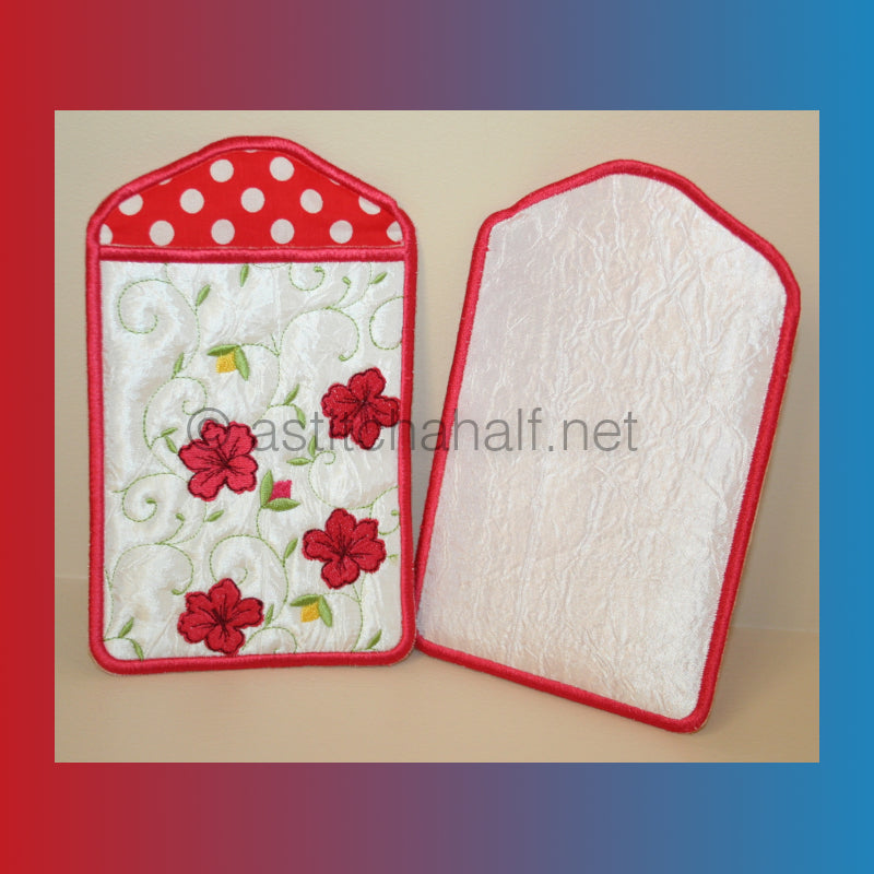 Two embroidered mobile phone covers and eyeglass pouches, one with red polka dots and the other with blue polka dots, both featuring floral patterns.